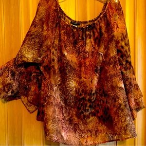 Nice, flowy & versatile long sleeve with bat wing style transparent blouse!